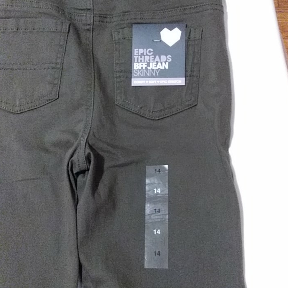Girls green skinny jeans